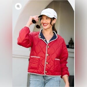 Red Puffer Jacket with White Trim and Quilted Design